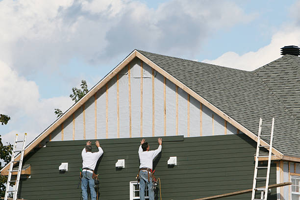 Professional Emergency Siding Repair technician working in Liberty, IN